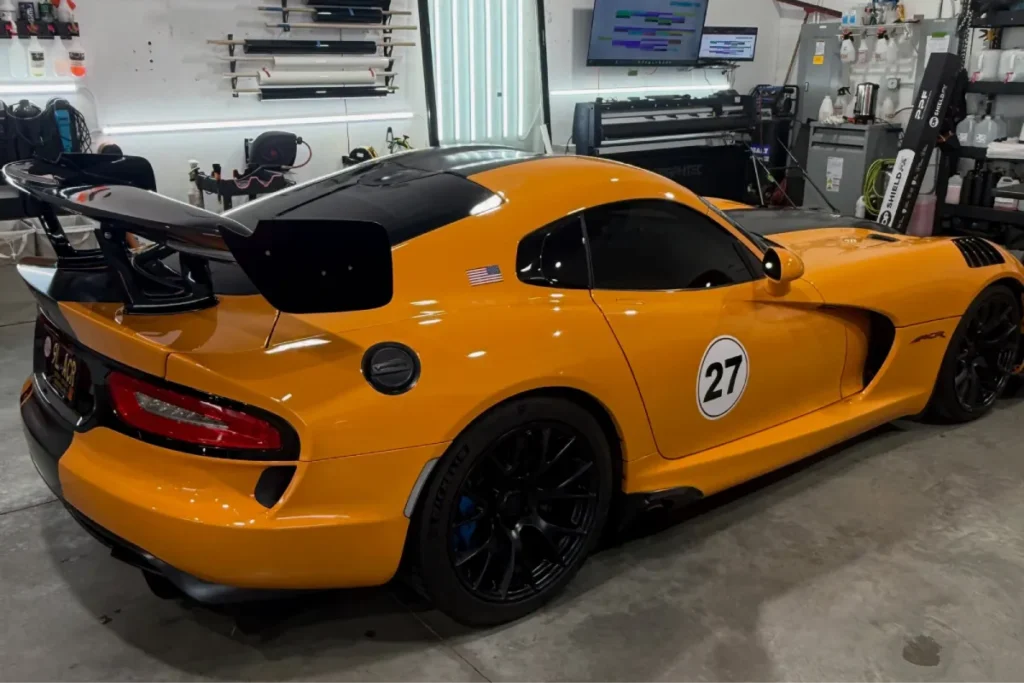 Paint protection film applied to a yellow Dodge Viper for long lasting paint protection.